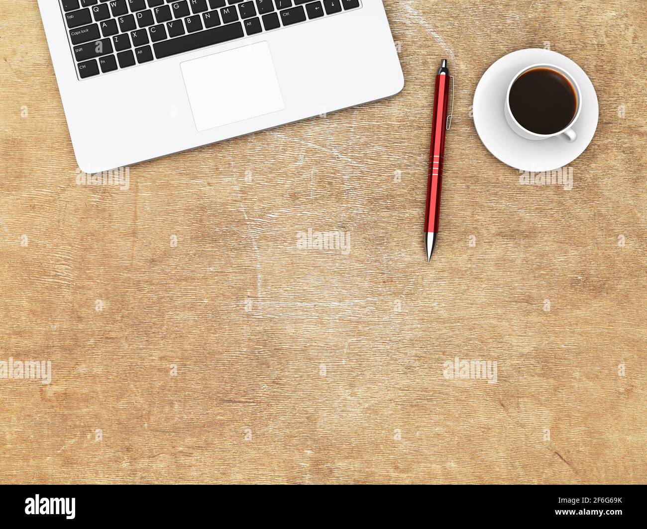 Laptop-Stift und Tasse Kaffee auf einem Holz zerkratzt Schreibtisch Stockfoto