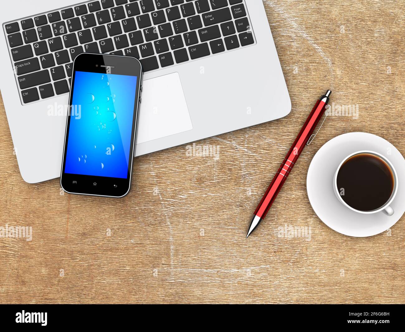Laptop, Mobiltelefon, Stift und Tasse Kaffee auf einem Holz zerkratzten Schreibtisch Stockfoto