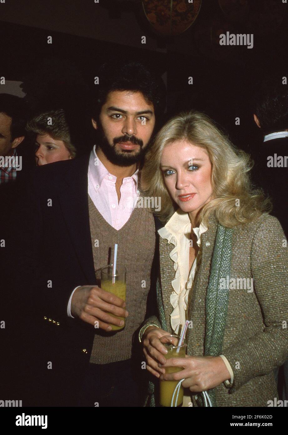 Donna Mills und Richard Holland während der „Entertainment Tonight“-Feier zum 100. Mal im Su Ling Restaurant in Los Angeles, Kalifornien 10. Januar 1982 Quelle: Ralph Dominguez/MediaPunch Stockfoto