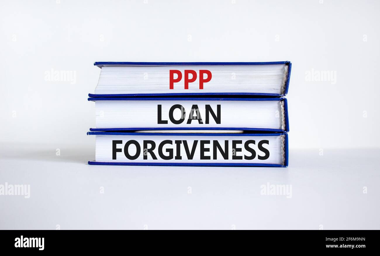 PPP, Paycheck-Schutz-Programm Darlehen Vergebung. Konzept Wörter PPP Darlehen Vergebung auf Büchern auf weißem Hintergrund. Business, PPP - Paycheck protectio Stockfoto