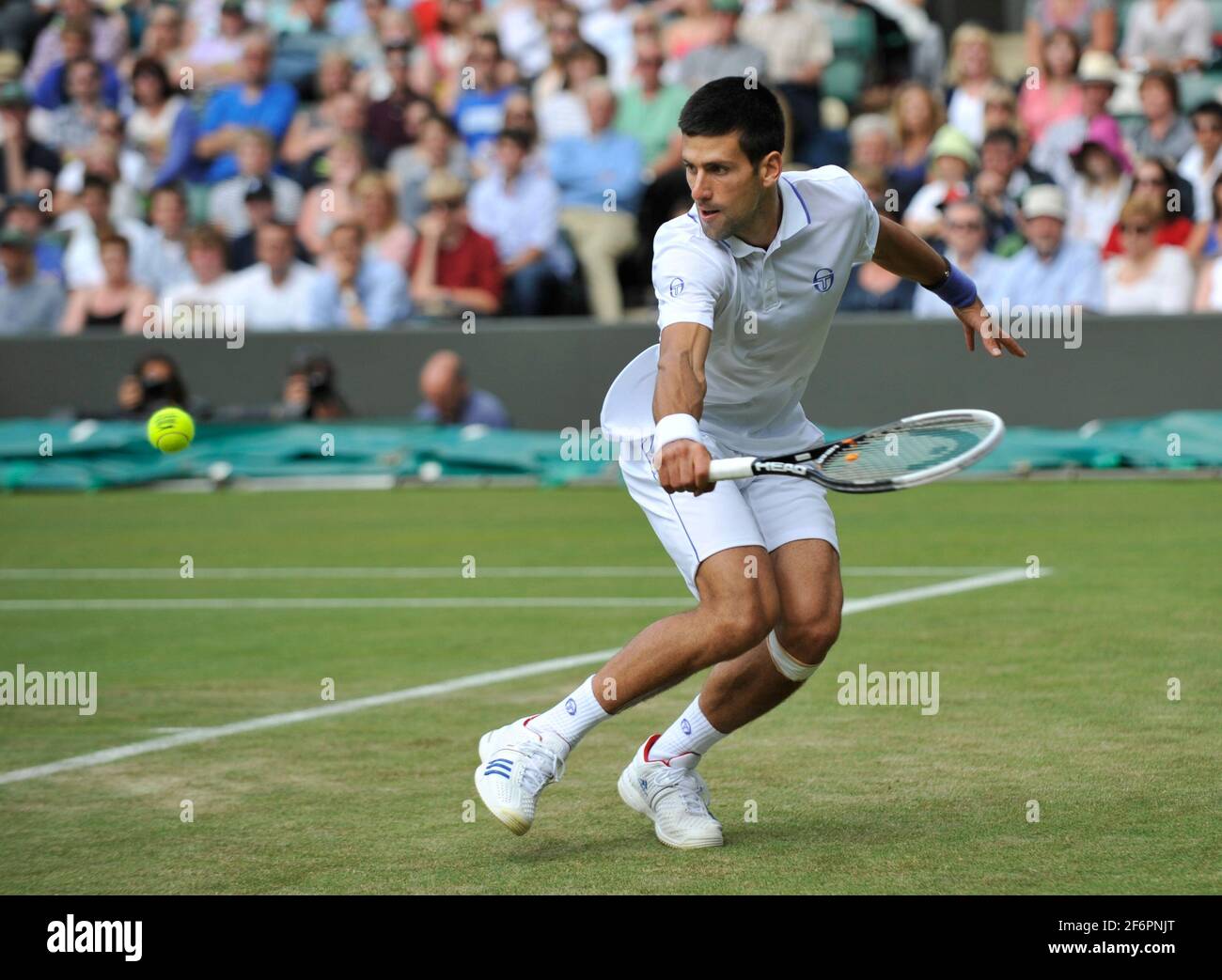 WIMBLEDON 2011. 4th Tage. NOVAK DJOKOVIC WÄHREND SEINES SPIELS MIT KEVIN ANDERSON. 23/6/2011. BILD DAVID ASHDOWN Stockfoto