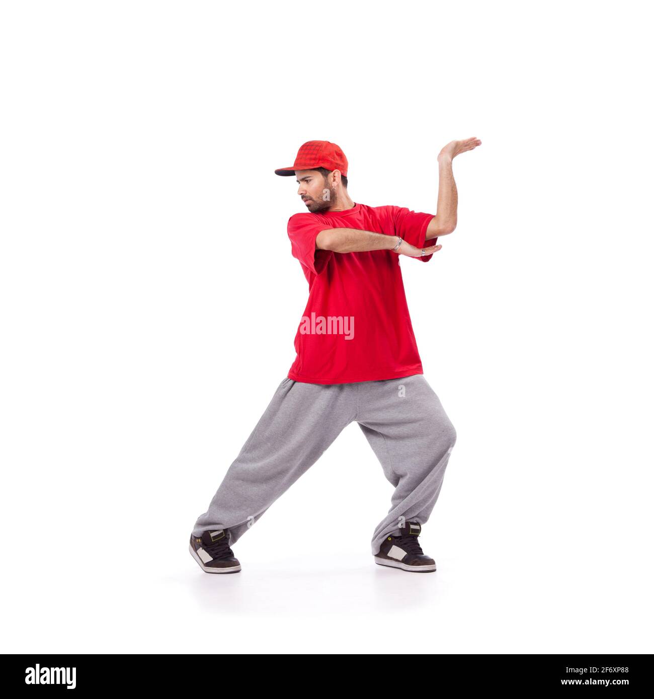 Hip-Hop-Tänzerin, die Bewegung isoliert auf weißem Hintergrund ausführt Stockfoto