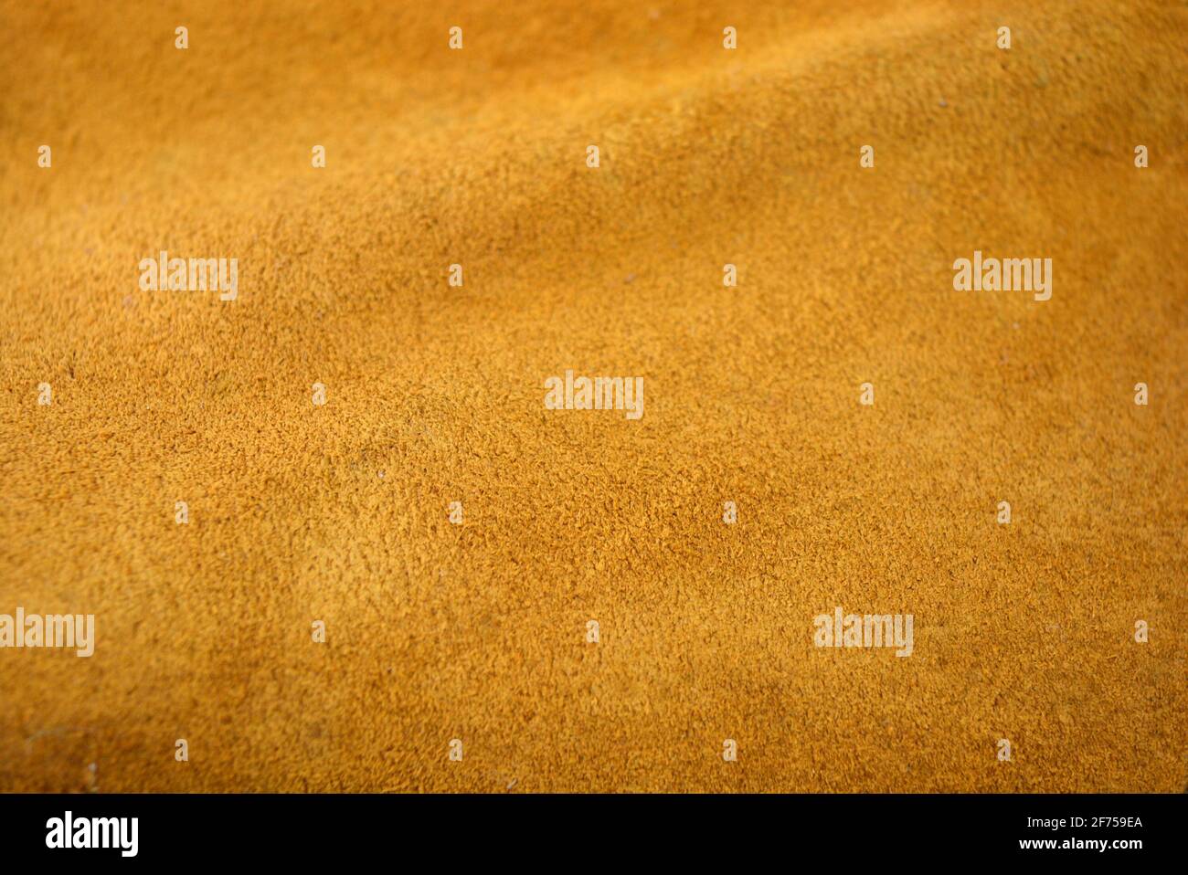 Brauner Hintergrund aus echtem Leder, natürliches Wildleder. Stockfoto