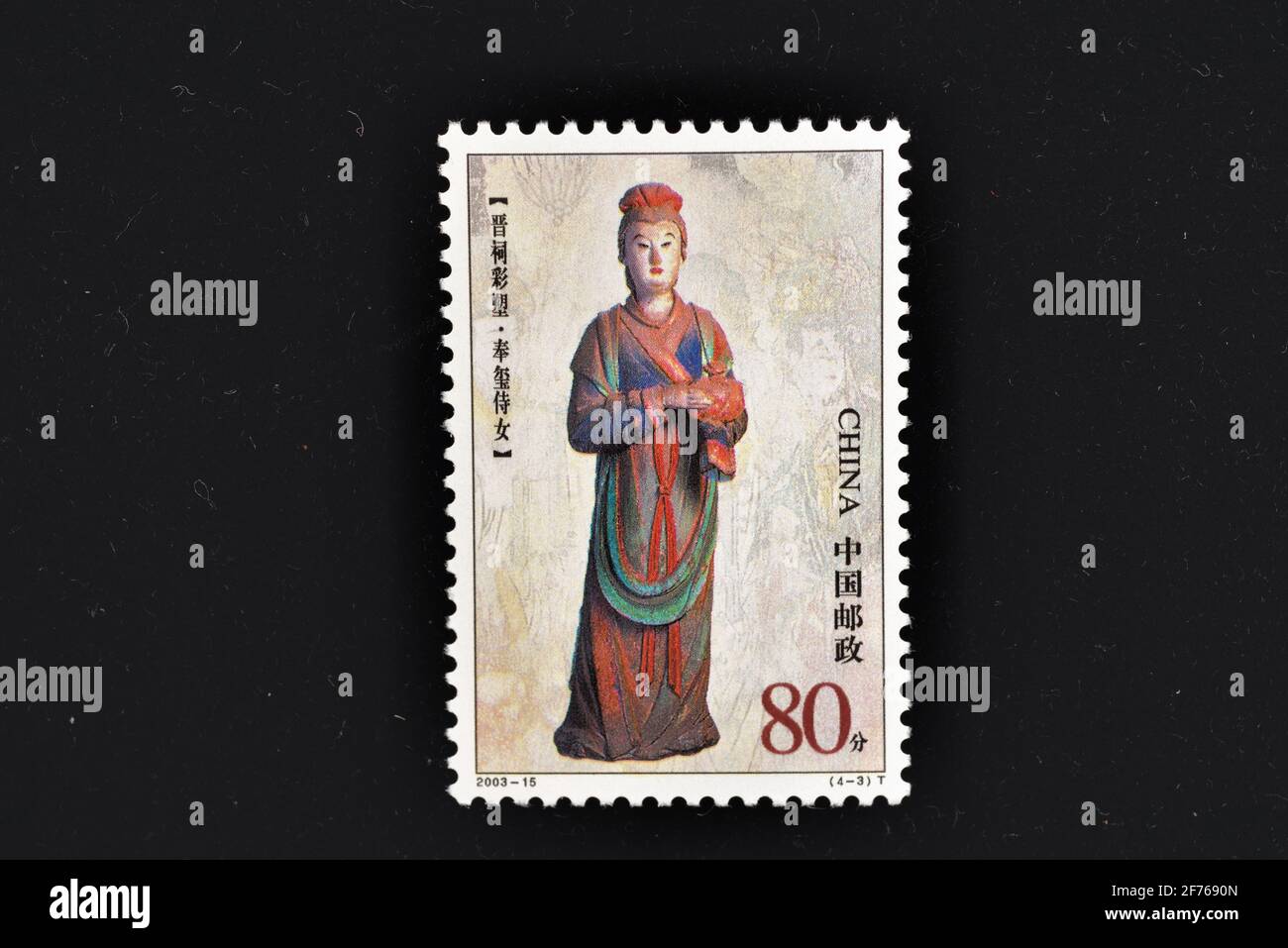 CHINA - UM 2003: Eine in China gedruckte Marke zeigt gemalte Statuen der Jinci-Tempelmädchen mit einem königlichen Siegel, um 2003. Stockfoto