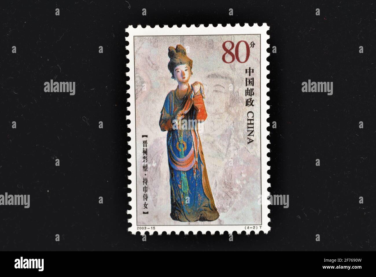 CHINA - UM 2003: Eine in China gedruckte Marke zeigt gemalte Statuen der Jinci-Tempelmädchen mit einem Handtuch, um 2003. Stockfoto