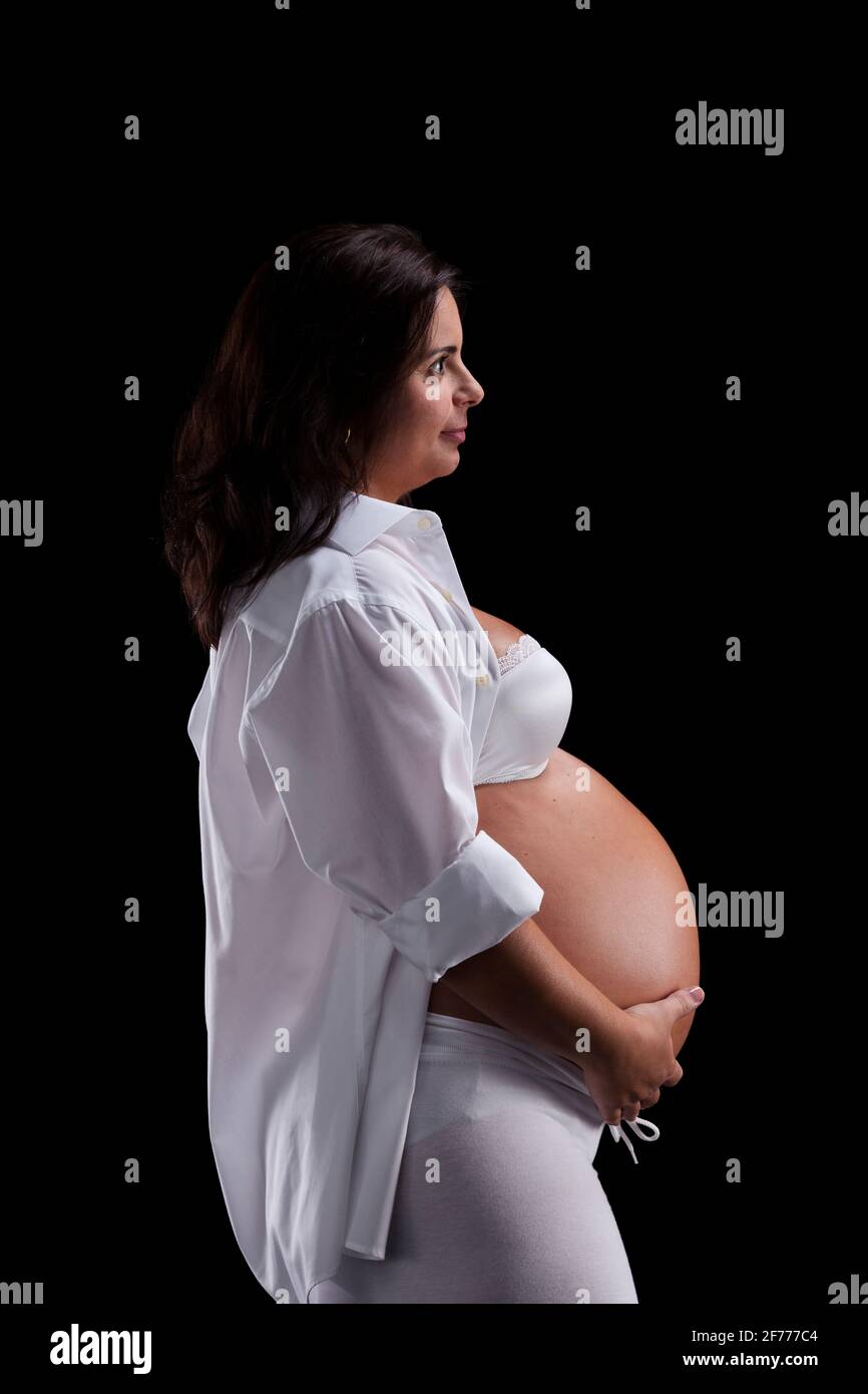 Glücklich schwanger Frau Stockfoto