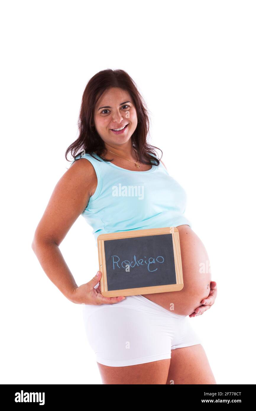 Eine Schwangerin, die den Namen des Babys zeigt Stockfoto