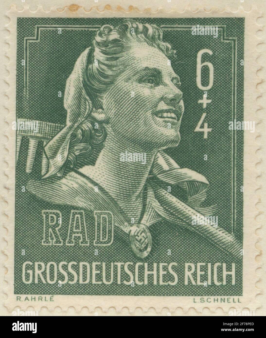 Briefmarke von Gösta Bodmans Philatelistenauftrag, begann 1950.die Briefmarke aus Deutschland, 1944. Motive des deutschen Arbeitermädchen mit nazistischen Kotelett-Emblem. 'Zur Ausstellungsreihe (Reich Arbeiter Dienst). Stockfoto