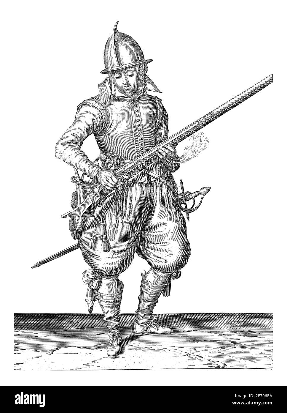 Ein Soldat, Full Length, rechts, mit beiden Händen ein Ruder (eine bestimmte Art von Schusswaffe) schütteln, um alle Pulver zu entfernen, die außerhalb des pa gefallen ist Stockfoto