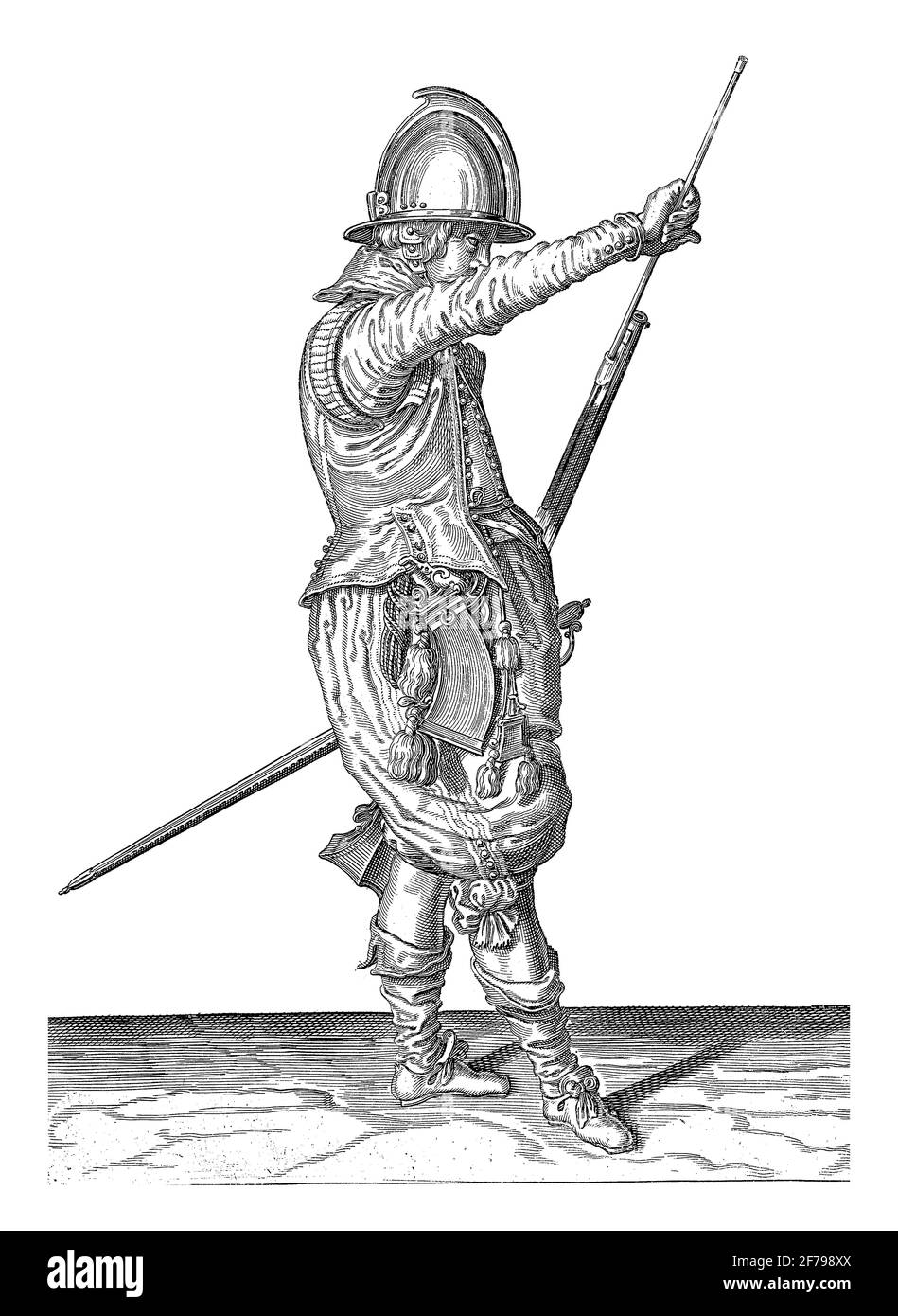 Soldat, der seine Ramrod unter dem Verlauf seines Ruders vom Halter entfernte, Vintage-Gravur. Stockfoto