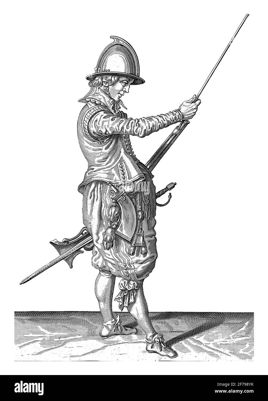 Soldat, der seine Ramrod unter seinem Ruder in den Halter schiebe, Vintage-Gravur. Stockfoto