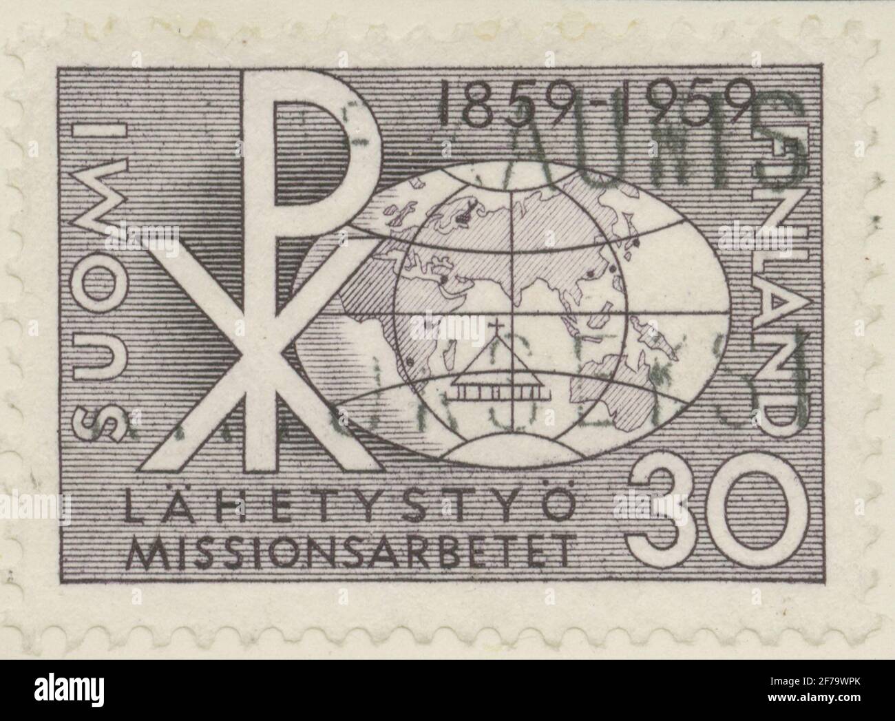 Die Briefmarke der Gösta Bodman's Philatelist Association, begann 1950, die Briefmarke aus Finnland, 1959. Motive des Globus. "Finnlands Missionsarbeit seit 100 Jahren 1859-1959". Stockfoto