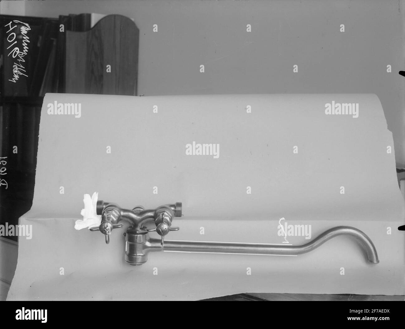 Wasserhahn k / v. Stockfoto