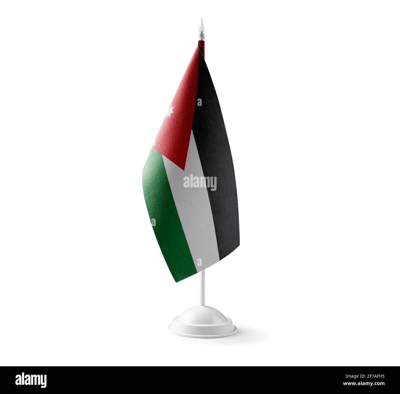 Kleine Nationalflagge des Jordans auf weißem Hintergrund Stockfoto