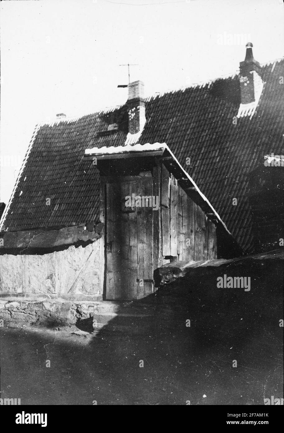 SkiopT-Ikone mit Motiven des Eingangs zu einer Taverne (Bierkeller) im Dorf Stolberg, Deutschland.das Bild wurde in Karton mit der Aufschrift Vårresan 1909 aufbewahrt. Stolberg 8. X. Bildtext: 'Stolberg im Harz. Eintritt zu Ratskeller'. Stockfoto