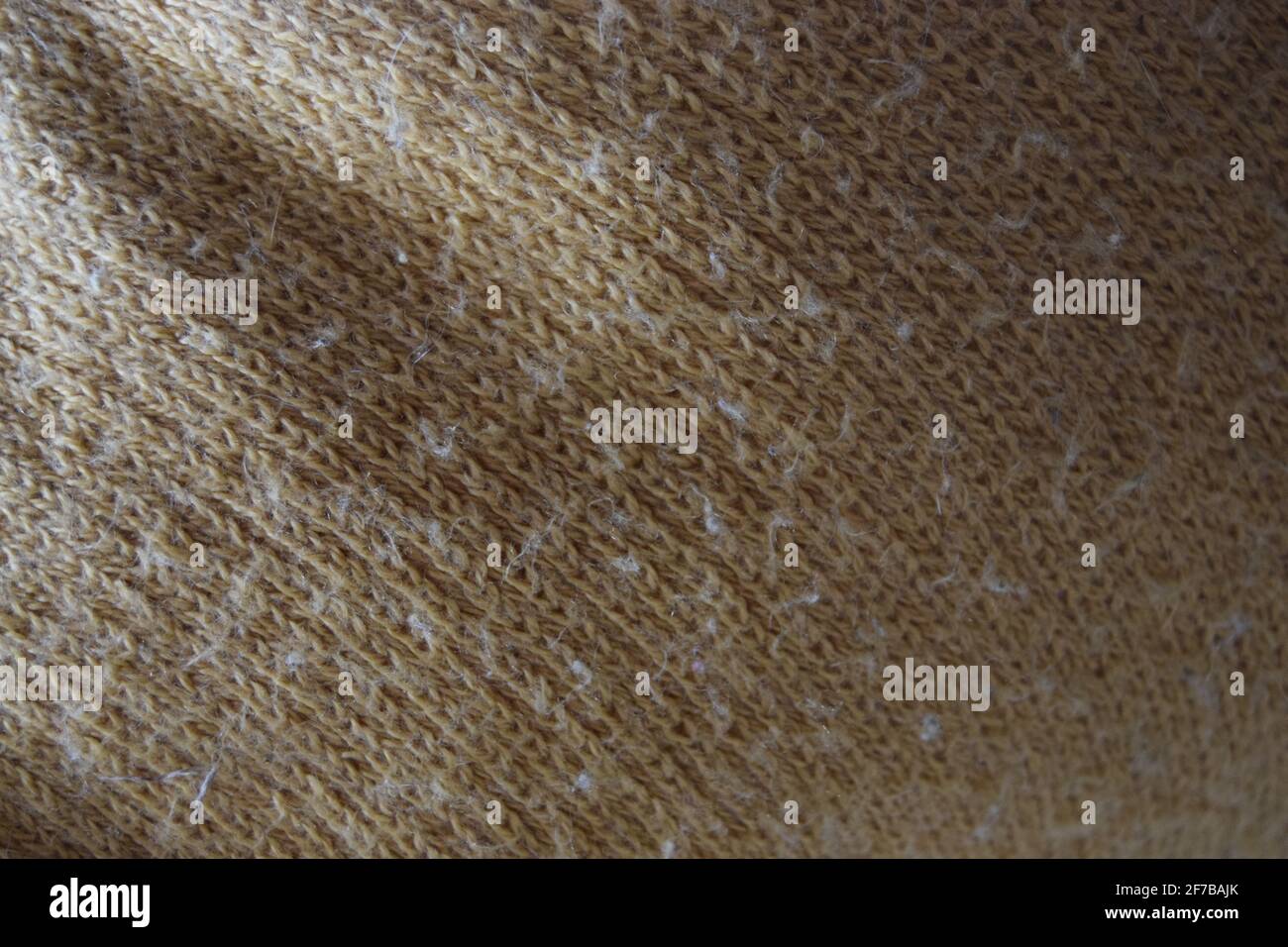 Hellgelbe Stoffstruktur Stockfoto