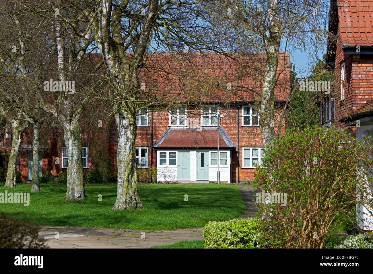 Gemauerte Häuser im Modelldorf New Earswick, in der Nähe von York, North Yorkshire, England Stockfoto