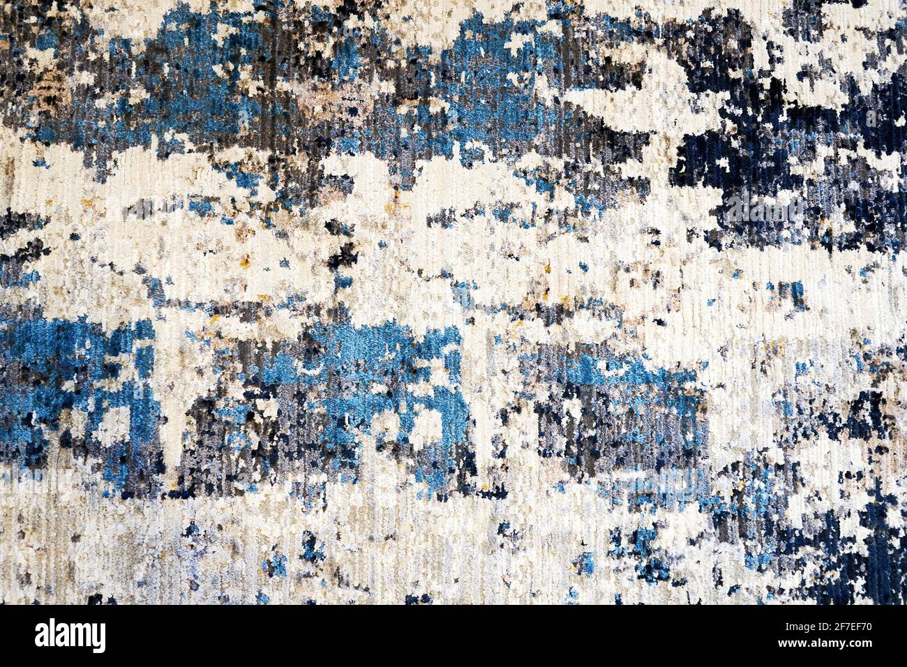 Abstraktes bunt gestreiftes Textilmuster mit verschiedenen Fäden und Farben. Innenarchitektur und Dekorationen Hintergründe Stockfoto