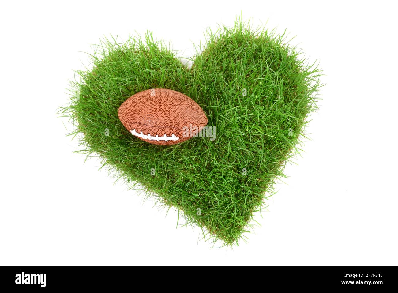 Grass Heart mit American Football Stockfoto