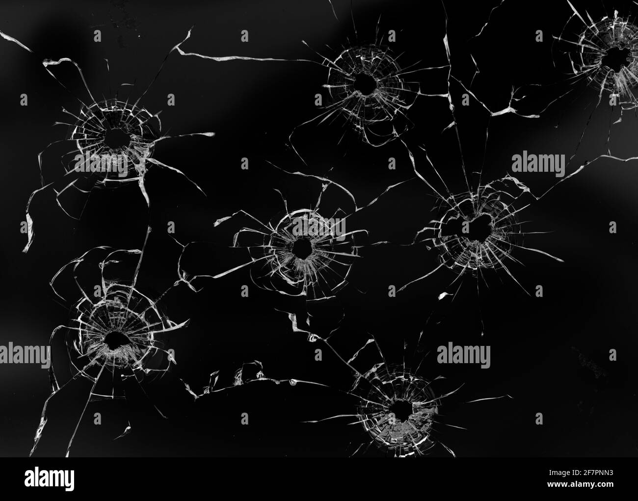 Loch im Glas auf schwarzem Hintergrund Stockfoto