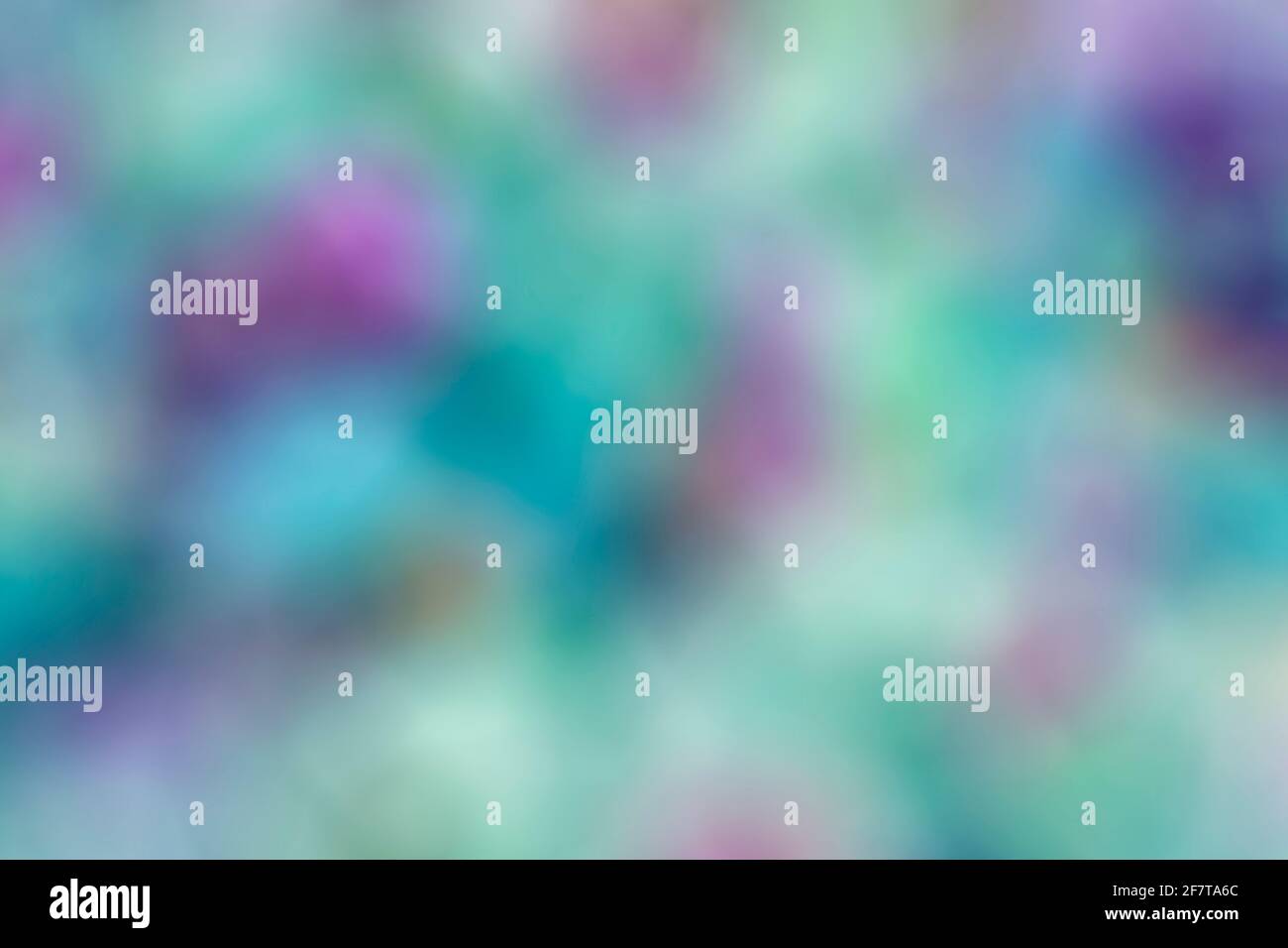 Helle Multi-Farben von Grün, Blau, Lila in einer Unschärfe-Bewegung abstrakte Hintergrundtextur verwischen Stockfoto