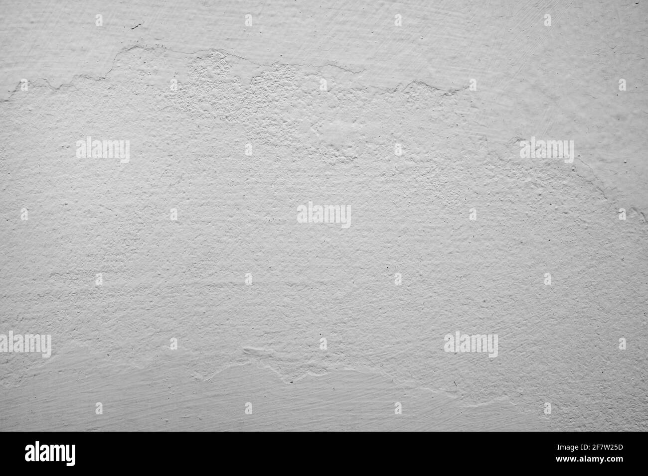Betonwand mit weiß gesprungenen Farbtextur Hintergrund Stockfoto