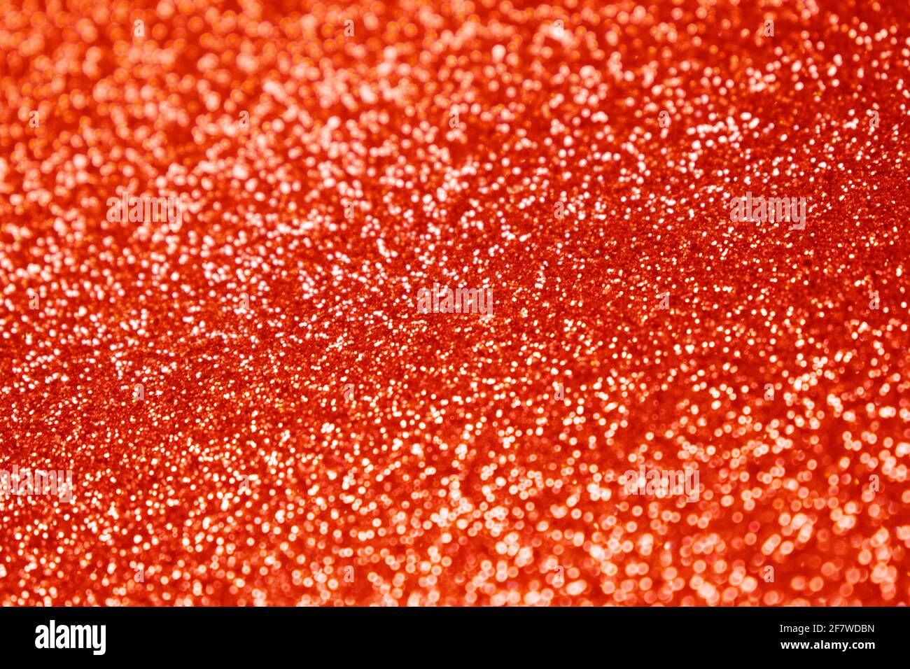 Bunte abstrakte verschwommen rot goldenen Hintergrund, Glitzer Textur weihnachten Stockfoto