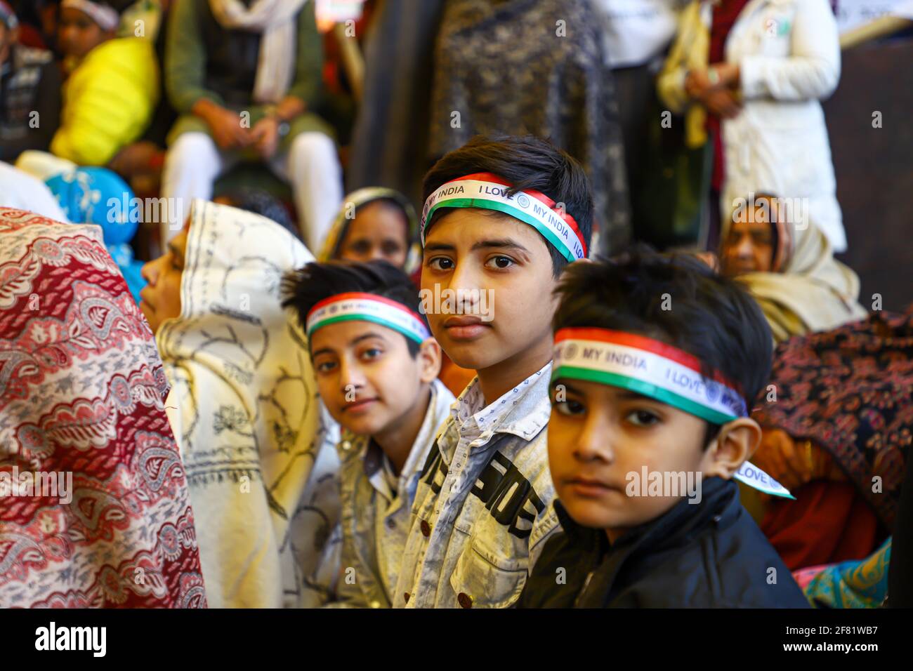 der indische muslimische Junge malte sein Gesicht während des Protests gegen das umstrittene Gesetz zur Änderung der Staatsbürgerschaft, das gegen muslime verstößt, mit drei Farben. Stockfoto