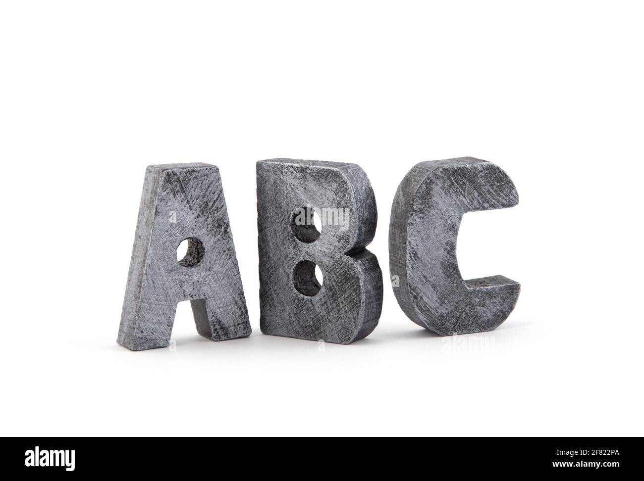 Vintage Holz Alphabet Blöcke isoliert auf weiß Stockfoto