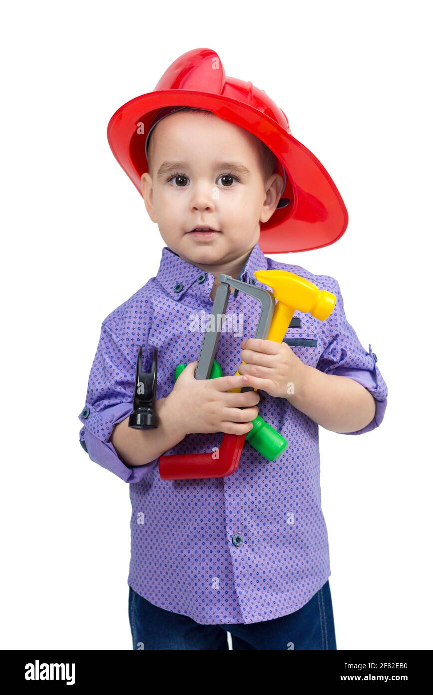 Kind 2-3 Jahre alt mit Spielzeug-Bauwerkzeug in den Händen. Stockfoto