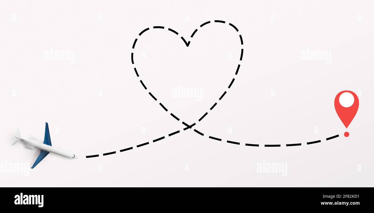 Flugzeug geht herzförmige Richtung zum endgültigen Ziel Stockfoto