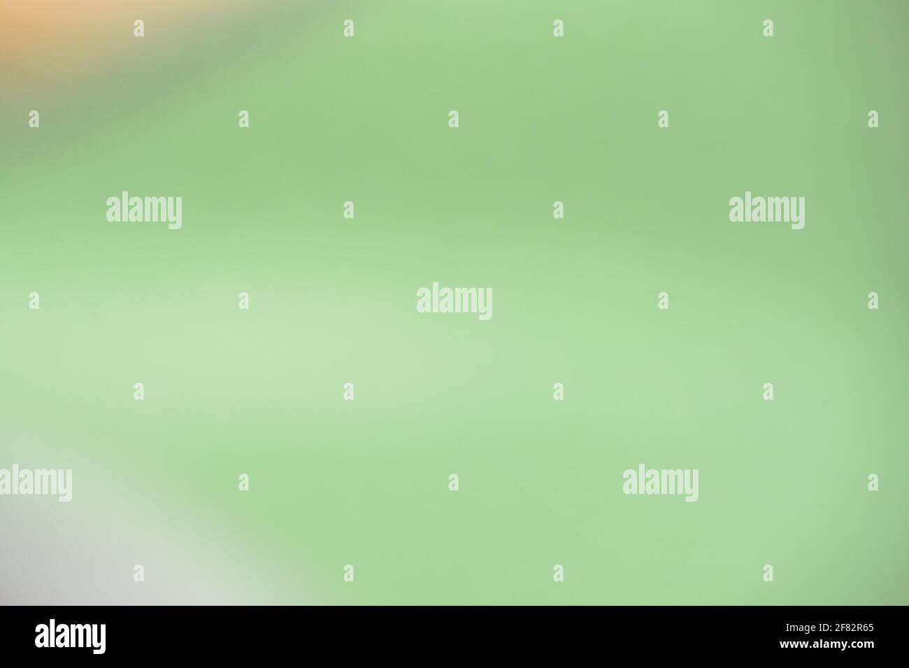 Gradient grünen Hintergrund für Tapeten und grafische Designs, verschwommen abstrakt grün Gradient pastell hellen Hintergrund smart verschwommen Muster. Stockfoto