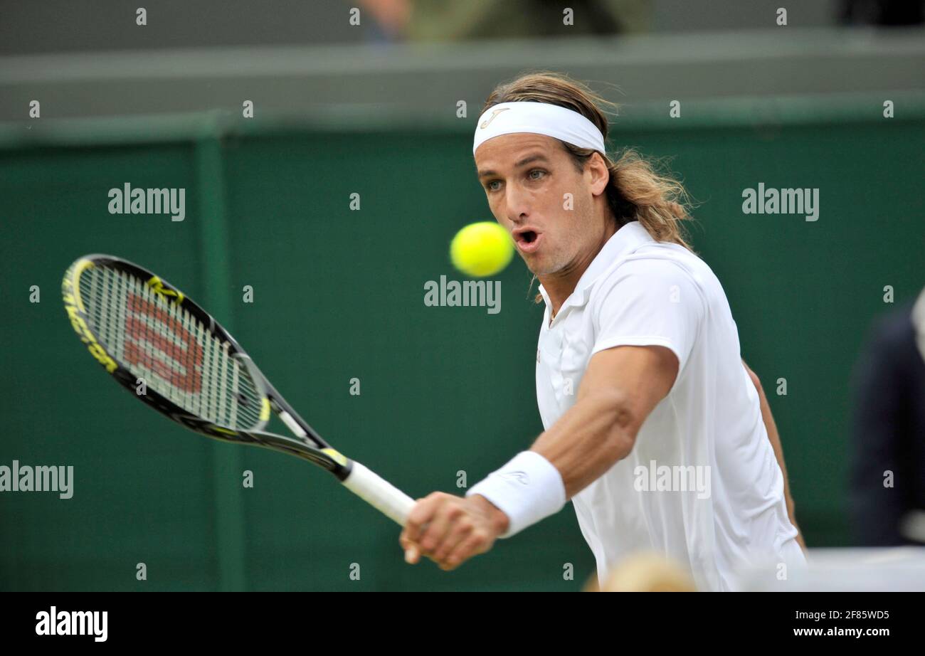 WIMBLEDON TENNIS CHAMPIONSHIPS 2008. 9. TAG 2/7/2008 HERREN QUATER-FINALE. F.LOPEZ WÄHREND SEINES SPIELS MIT M.SAFIN. BILD DAVID ASHDOWN Stockfoto