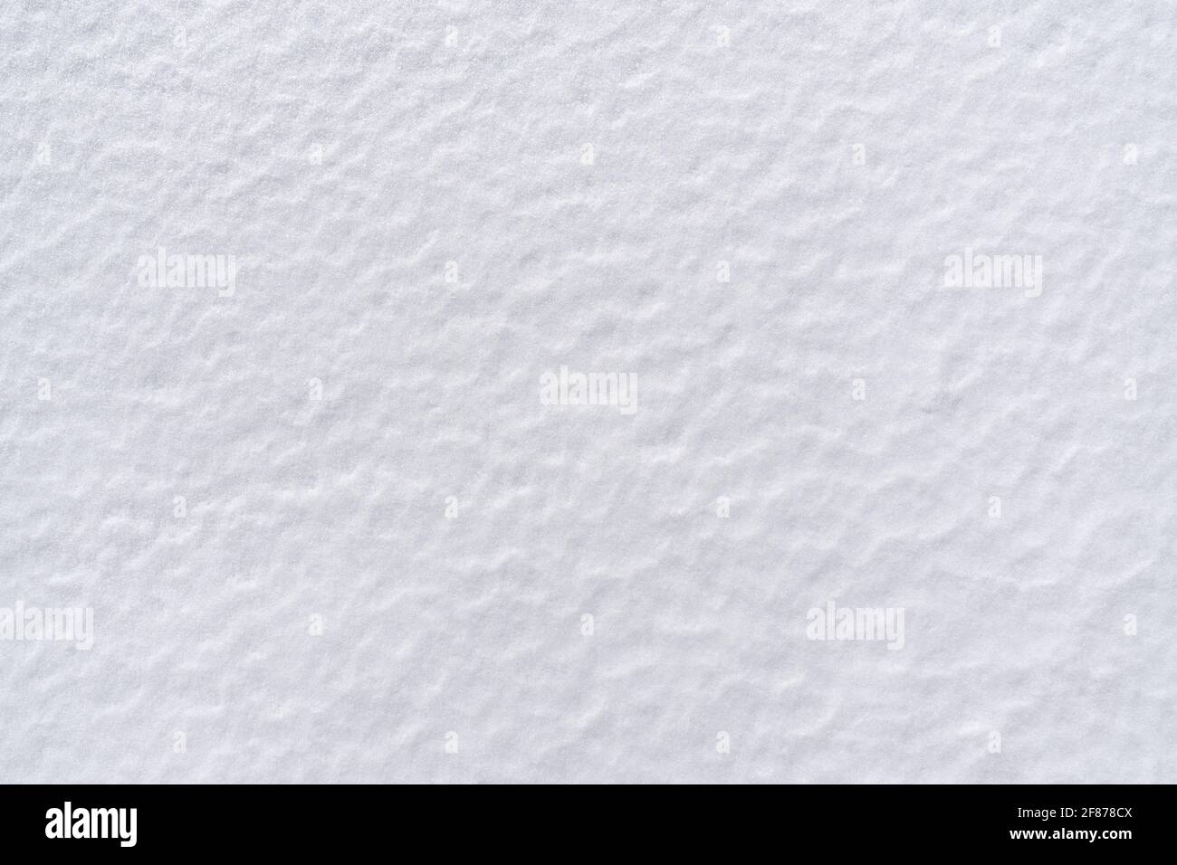 Weiße, frische Schneestruktur in Nahaufnahme Stockfoto