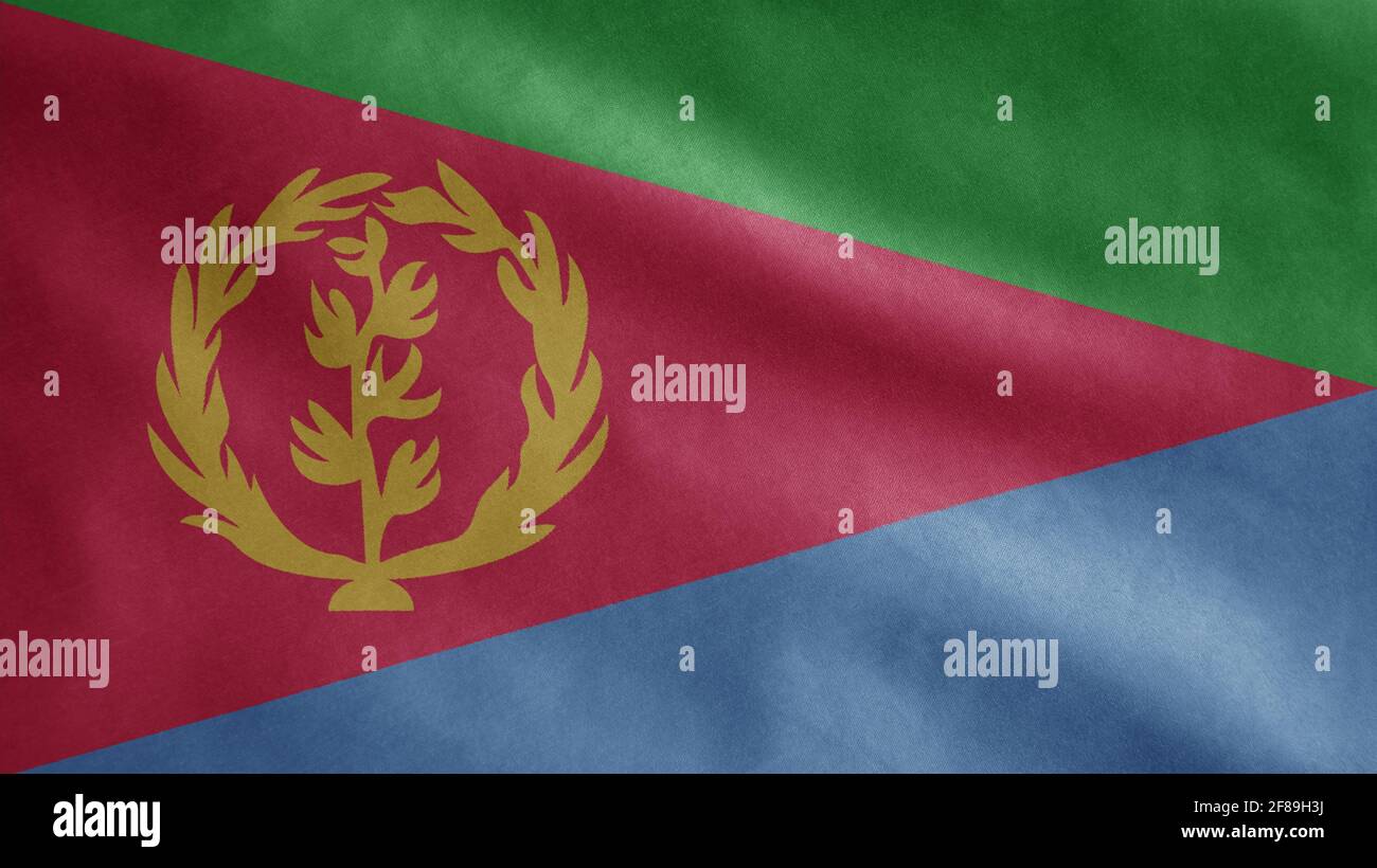 Eritreische Flagge winkt im Wind. Nahaufnahme des eritrea-Banners, weiche und glatte Seide. Stoff Stoff Textur Fähnrich Hintergrund. Stockfoto