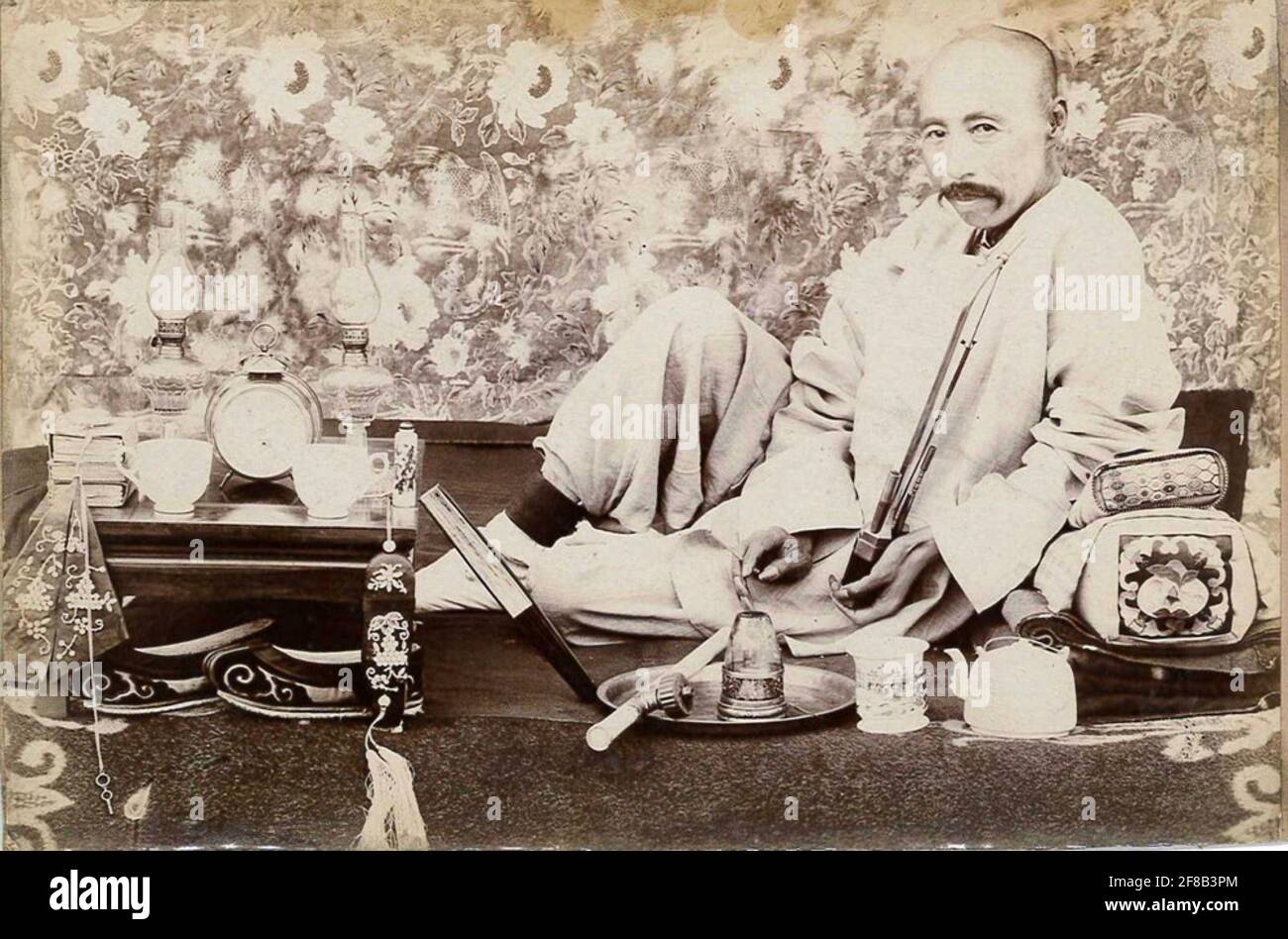 Frühe Fotografie eines chinesischen Opiummichgers Stockfoto
