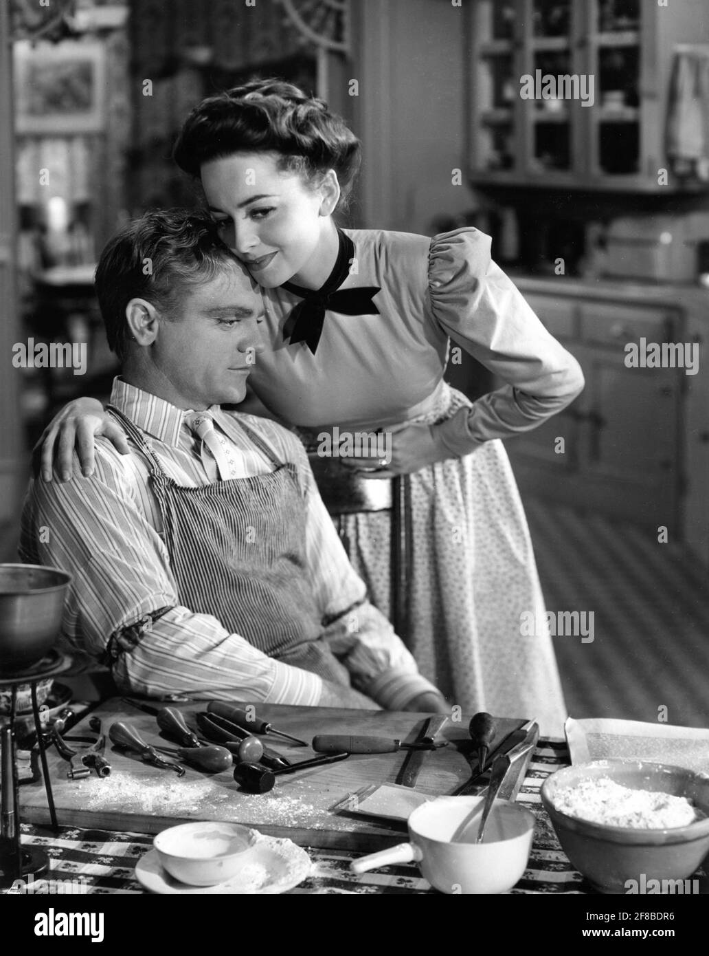 JAMES CAGNEY und OLIVIA de HAVILLAND im ERDBEERBLONDEN 1941 Regisseur RAOUL WALSH Drehbuch Julius J. und Philip G. Epstein nach dem Stück One Sunday Afternoon von James Hagan gowns Orry-Kelly Warner Bros Stockfoto