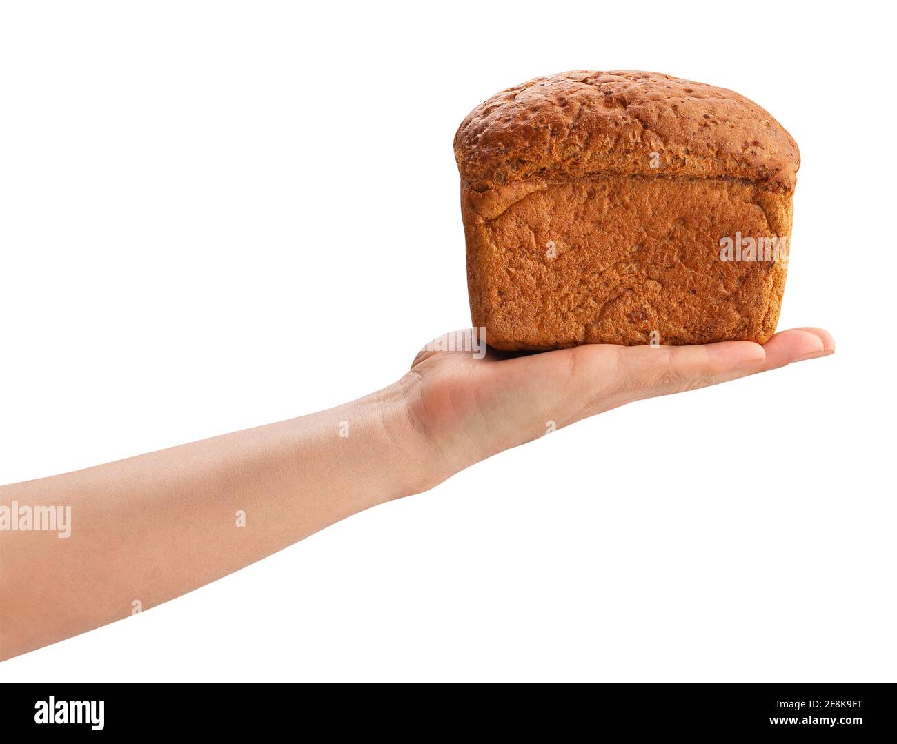 Braunes Brot in der Hand weg auf Weiß isoliert Stockfoto