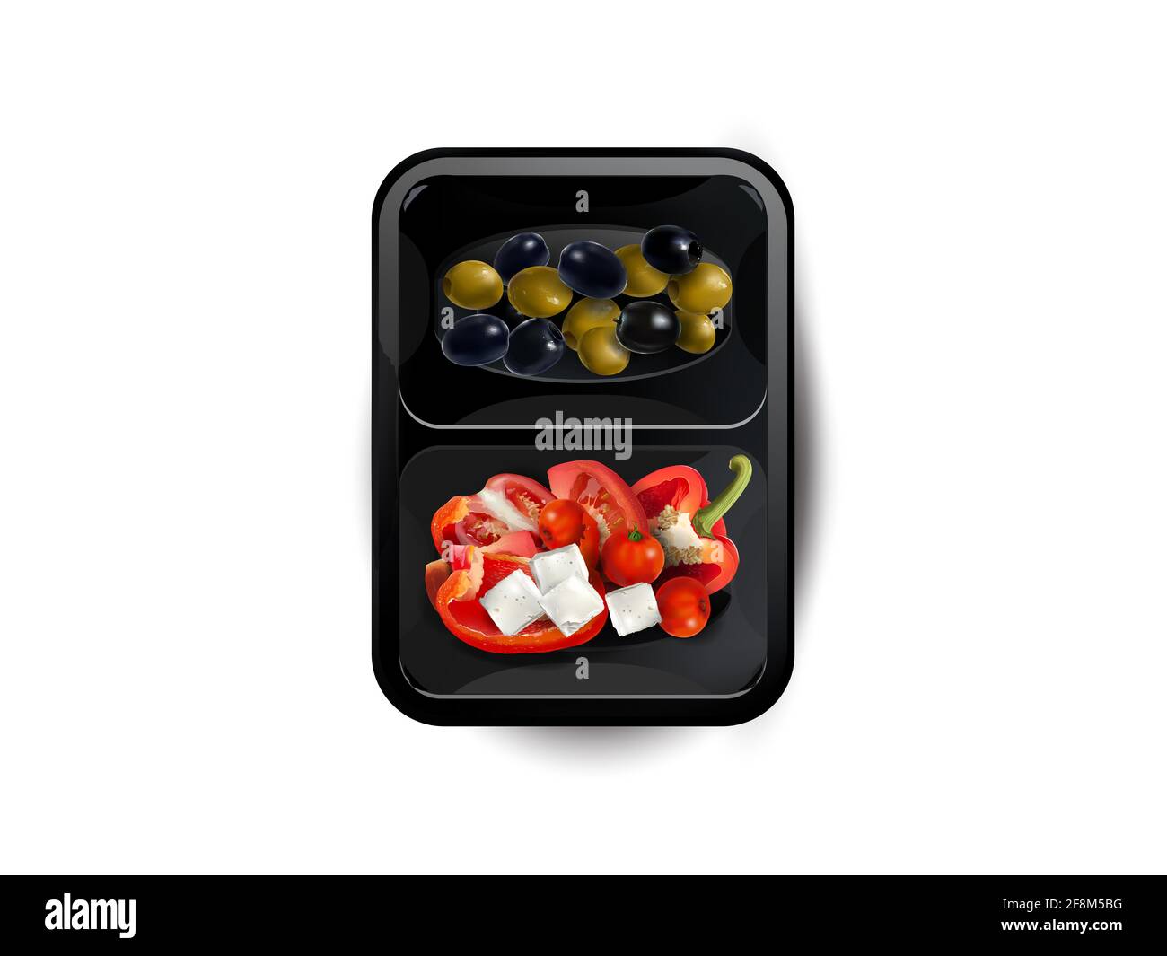 Gemüse und Feta-Käse in einer Lunchbox. Stockfoto