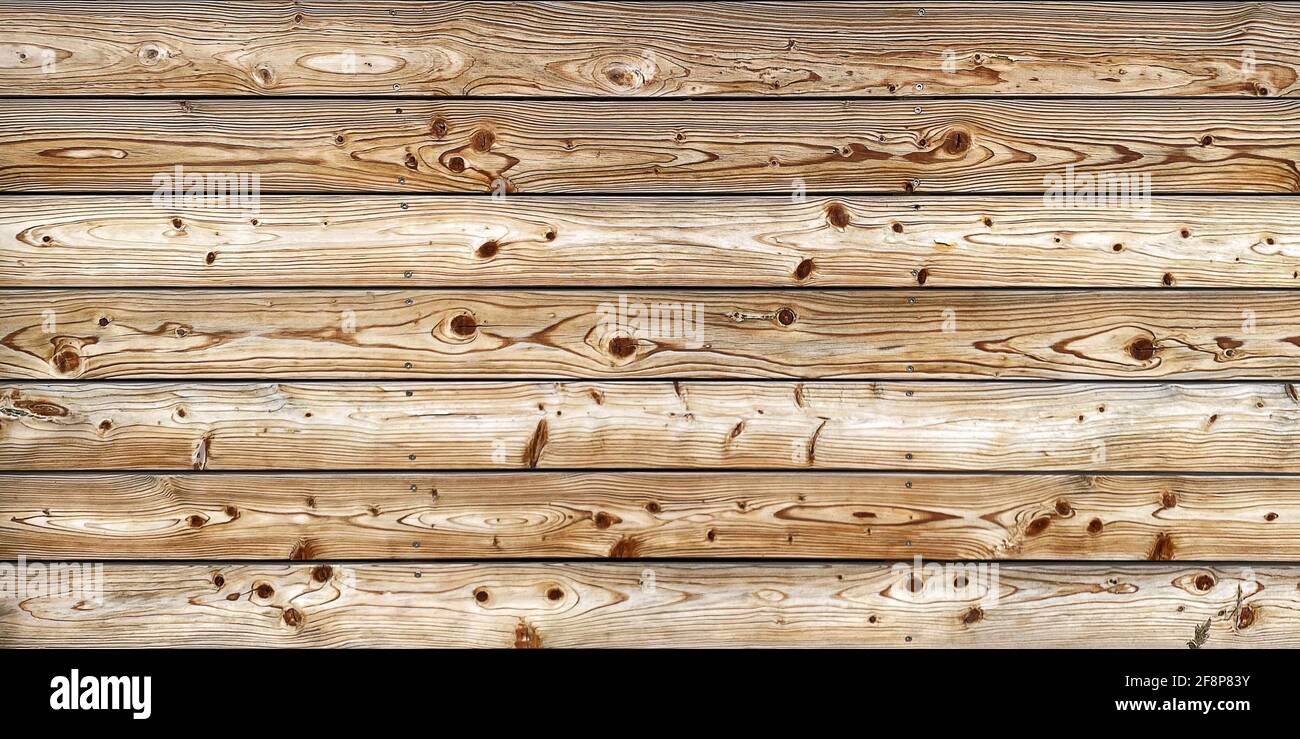 Holzhintergrund mit braun verwitterten Planken. Naturholzmuster Stockfoto