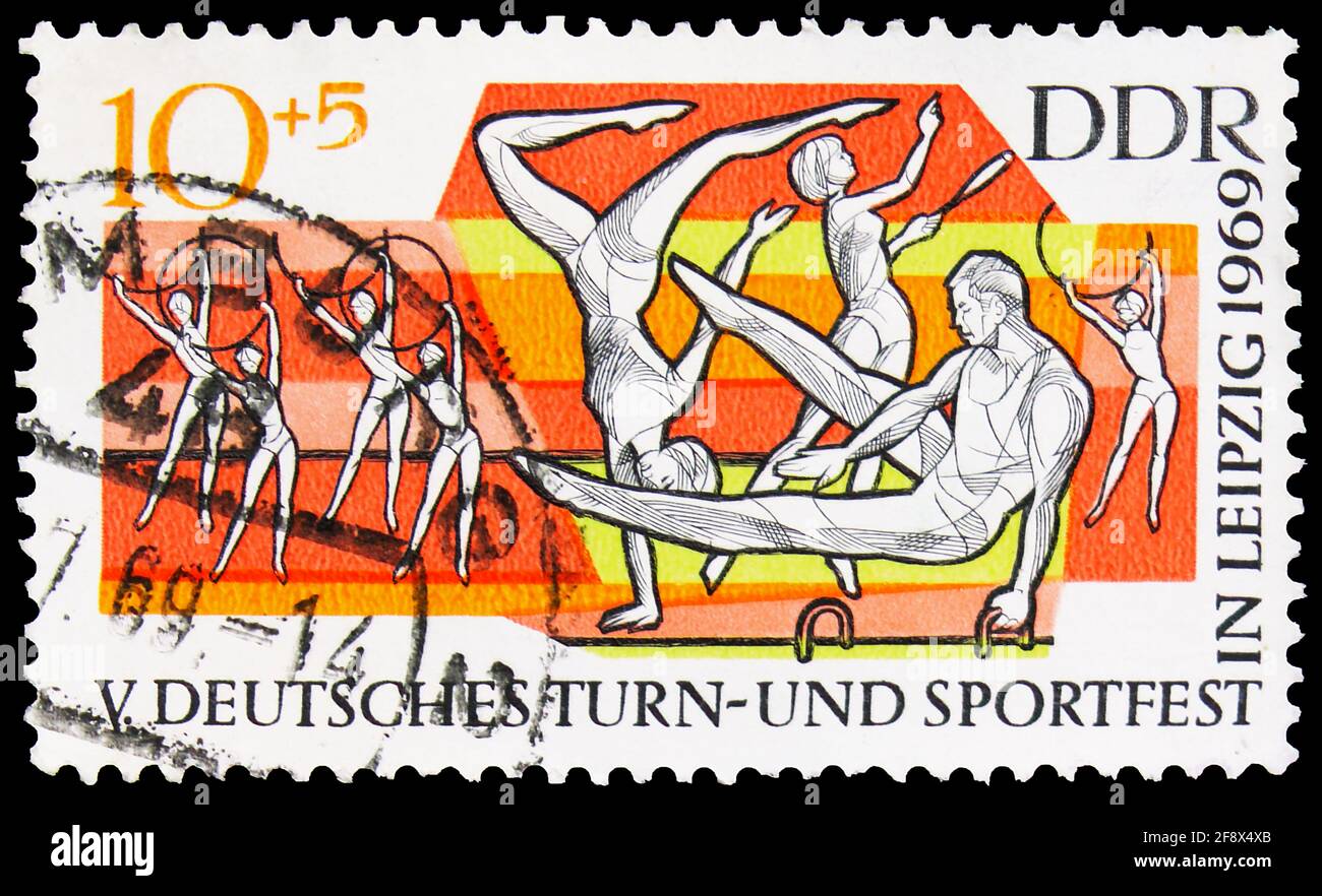 MOSKAU, RUSSLAND - 1. OKTOBER 2019: Briefmarke gedruckt in Deutschland, Demokratische Republik, zeigt Gymnastik, 5. Deutsche Gymnastik und Sport F Stockfoto