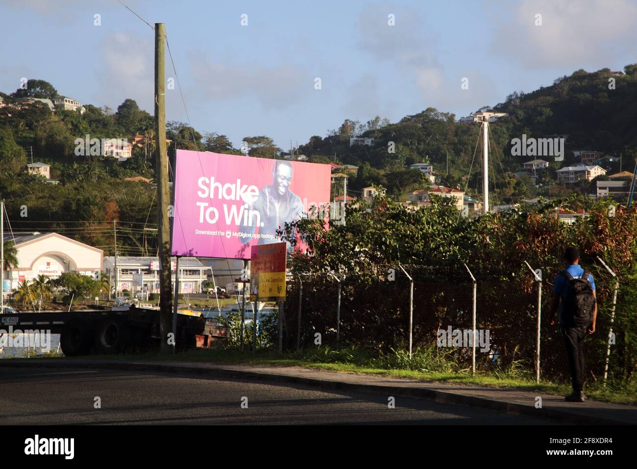 St. George's Grenada Billboard schütteln, um zu gewinnen und Schuljunge zu gehen In der Nähe von St. George's Stockfoto