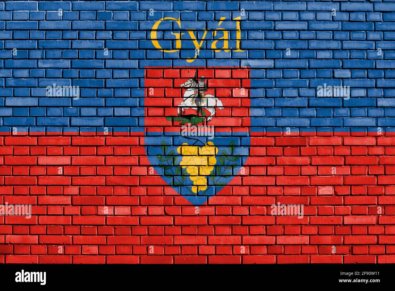 Flagge von Gyal auf Ziegelwand gemalt Stockfoto