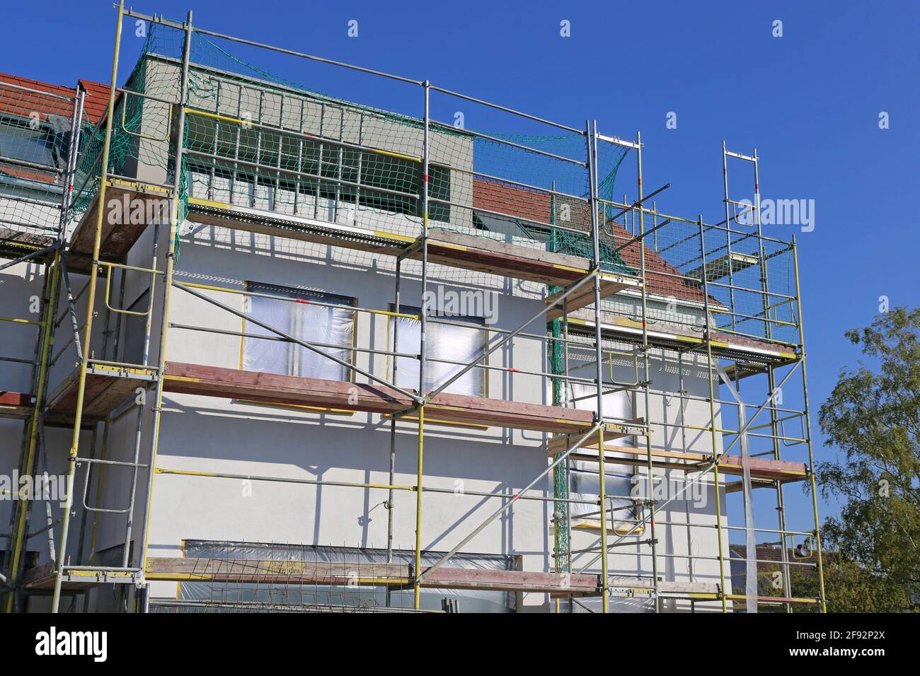 Neubau mit fertiger Grundputz Stockfoto