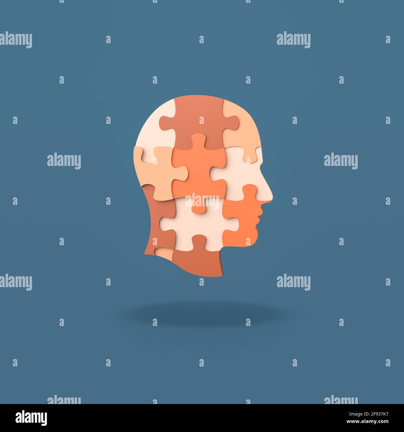 Menschliche Puzzle Kopf Form auf blauem Hintergrund Stockfoto