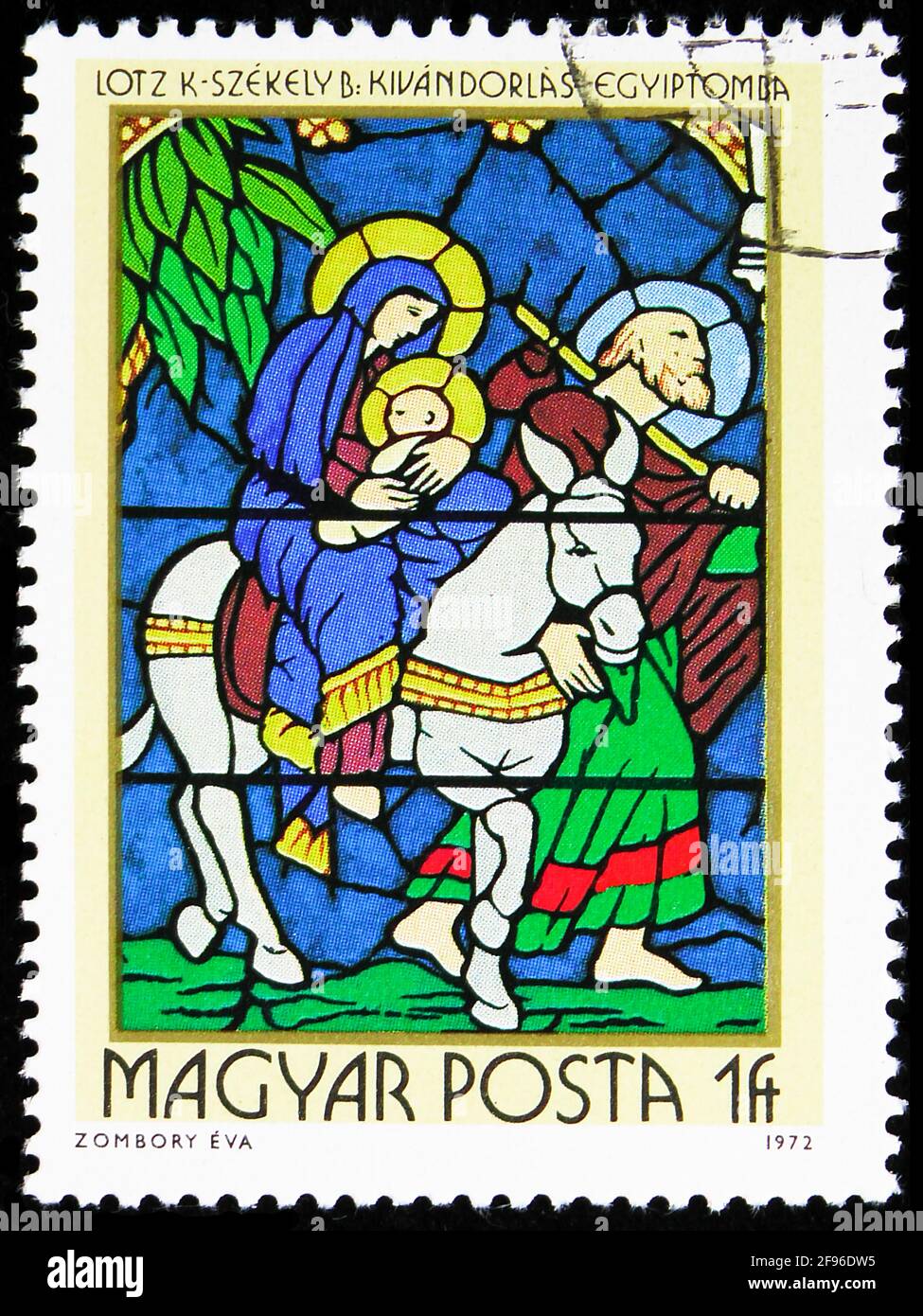 MOSKAU, RUSSLAND - 21. AUGUST 2019: Die in Ungarn gedruckte Briefmarke zeigt die Flucht nach Ägypten, von Károly Lotz und Bertalan Székely, Buntglasfenster Stockfoto