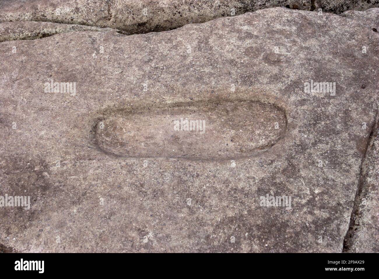 Footprint in Dunadd Fort, Nr Kilmartin, Argyll, Schottland Stockfoto