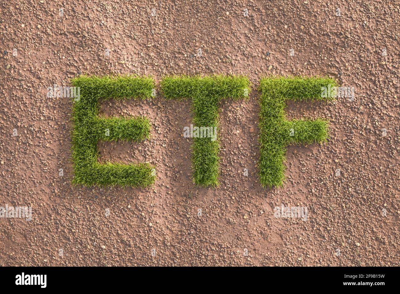 Grünes Gras Buchstaben ETF in einer ungrünen Landschaft. Konzept für Exchange Traded Funds, die nach den Standards der Umweltstandards (Social Governance) anlegen. Stockfoto