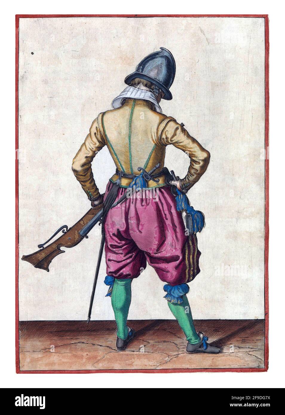 Ein Soldat, voller Länge, von hinten gesehen, hält ein Ruder (eine bestimmte Art von Schusswaffe) mit seiner linken Hand am linken Oberschenkel, wobei der Lauf nach upw zeigt Stockfoto