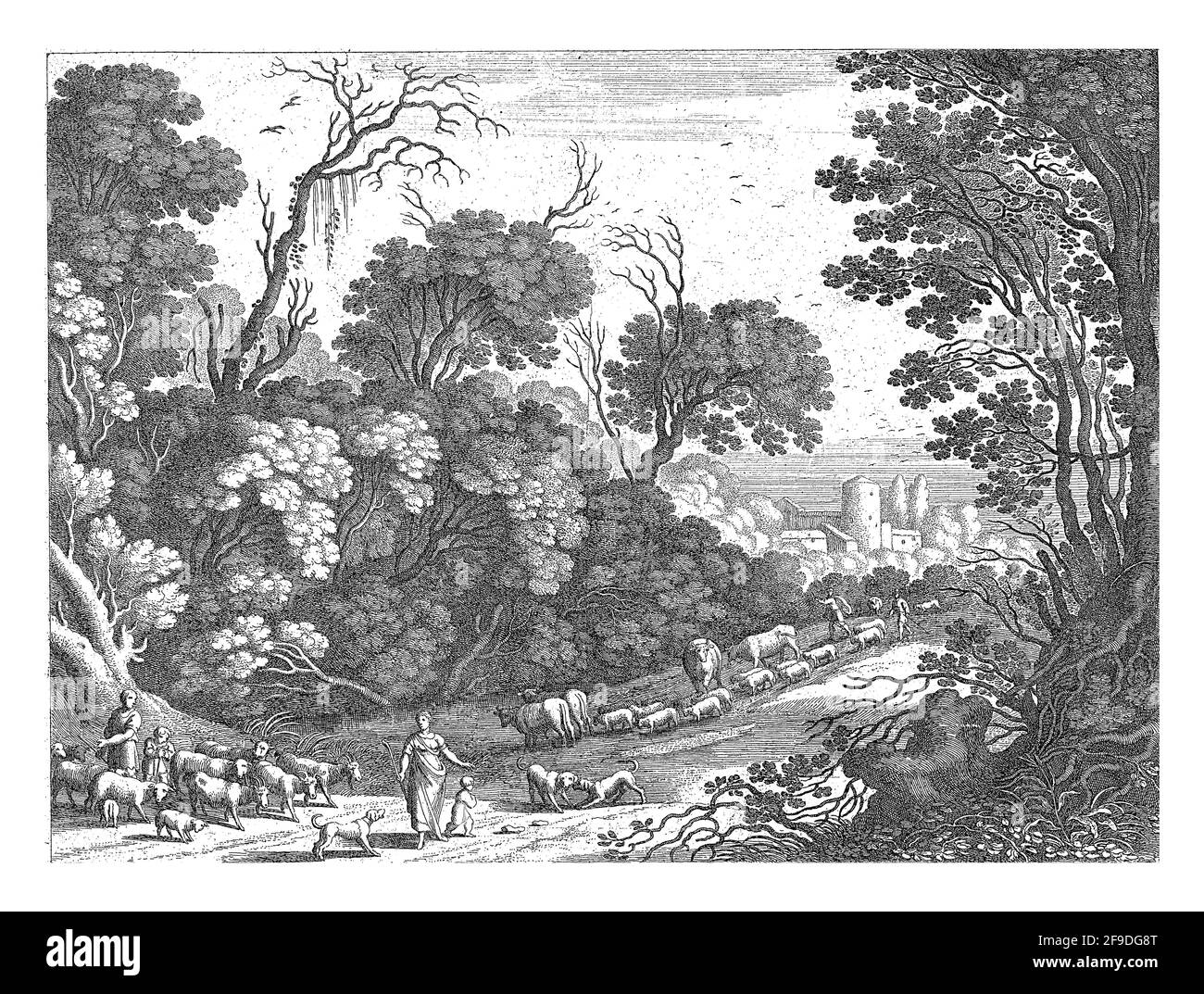 Auf einer Straße in einem Wald gehen ein Mann und eine Frau mit zwei Kindern, einige Hunde und eine Herde Ziegen und Schafe. Im Hintergrund zwei Hirten mit einem Stockfoto